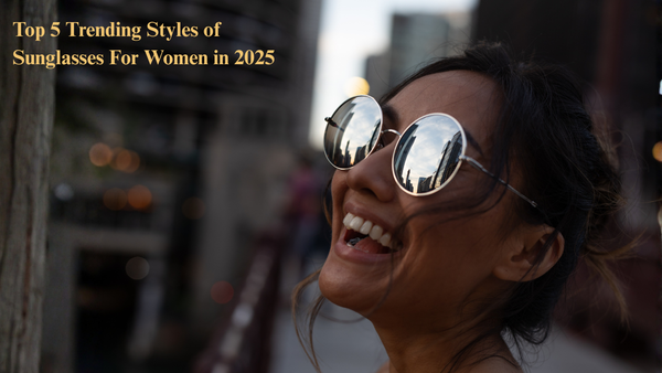 Woman wearing round mirrored sunglasses reflecting city skyline, showcasing one of the top trending sunglasses styles for women in 2025