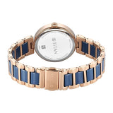 Titan Purple Ceramics Blue Dial Women’s Watch 95214KD05