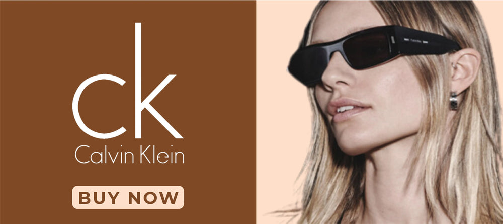 Close-up of a woman wearing sleek black Calvin Klein sunglasses, highlighting the modern and elegant design. Brown and beige background with Calvin Klein branding and a "Buy Now" call-to-action.